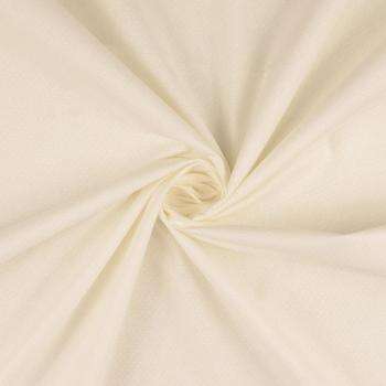 Vente de tissu  Faux uni écru avec petits points en 140 cm de large à petit prix